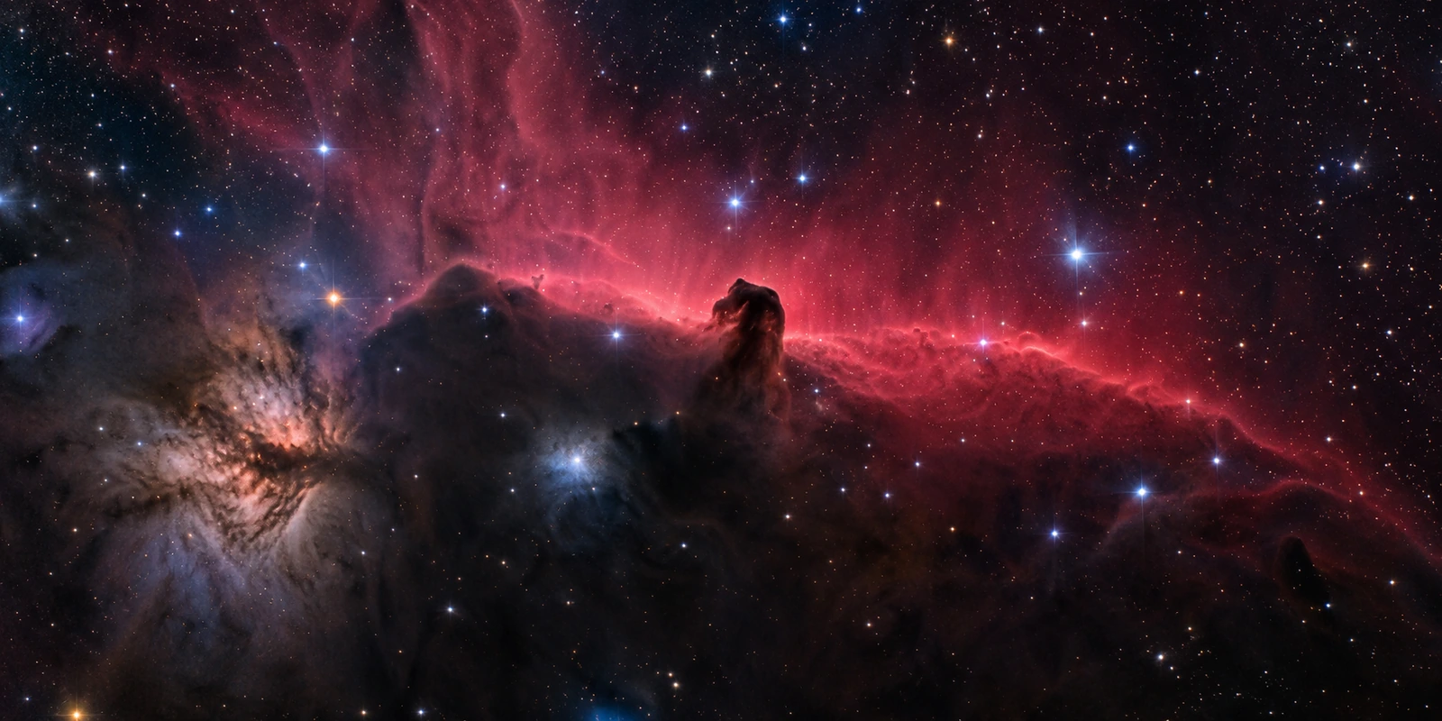 Illustration créée par IA inspirée de l’astrophotographie : nébuleuse de la Tête de Cheval et nuages lumineux rouges dans un champ d’étoiles.